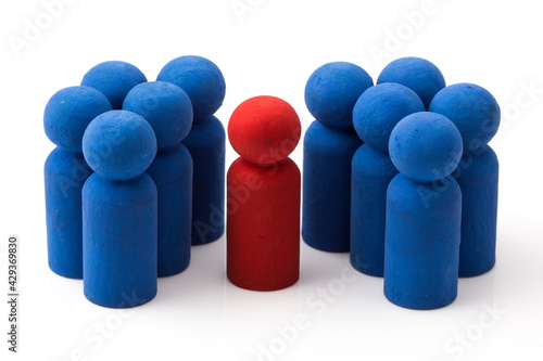 Be unique and different. Red figurine is stand out from the crowd.