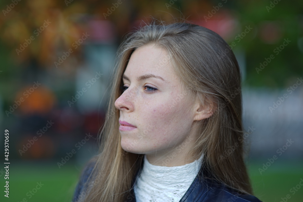 Portrait of a young beautiful girl in the park Portrait of a young beautiful girl in the park