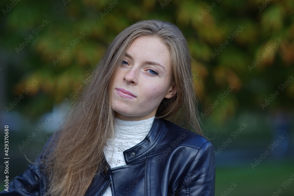 Portrait of a young beautiful girl in the park Portrait of a young beautiful girl in the park
