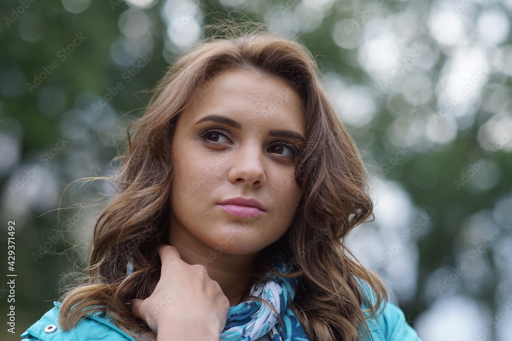 Portrait of a young beautiful girl in the park Portrait of a young beautiful girl in the park