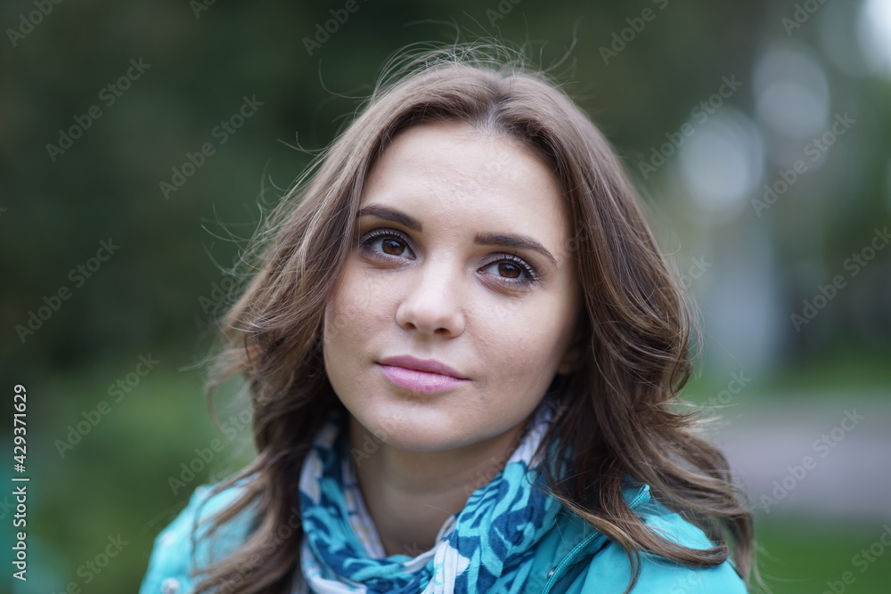 Portrait of a young beautiful girl in the park Portrait of a young beautiful girl in the park