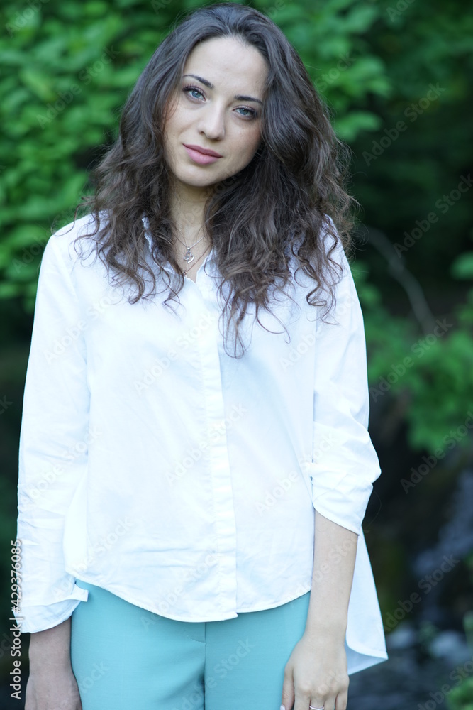 Portrait of a young beautiful girl in the park Portrait of a young beautiful girl in the park