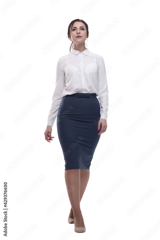 businesswoman in a white blouse and black skirt striding forward. businesswoman in a white blouse and black skirt striding forward.