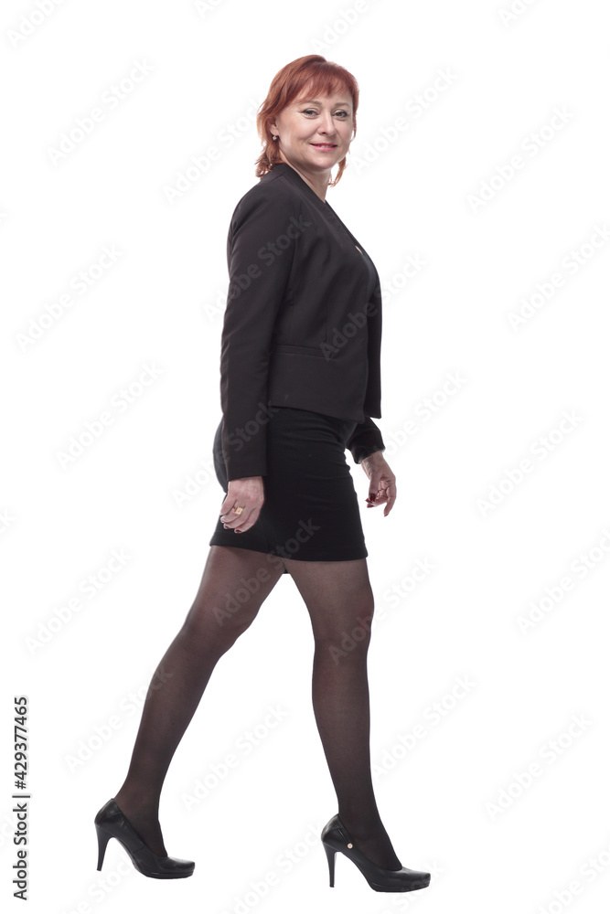 Fototapeta premium in full growth. modern business woman stepping forward.