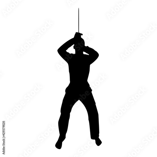 Silhouette man with sword machete from above cold weapons in hand military man soldier serviceman in positions hunter with knife fight poses strong defender warrior concept weaponry stand black color 