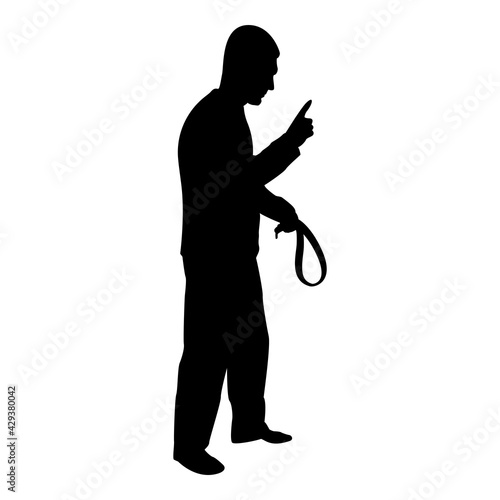 Silhouette angry man with belt in hand for punishment warns showing index finger violence in family concept abuse idea domestic trouble fury male threatening victim social problem husband father emoti