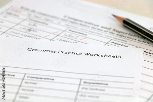 English grammar practice sheet with handwriting
