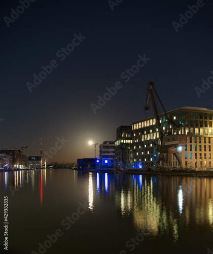 MUNSTER, GERMANY - the Inner harbor of Munster at full moon in Munster, North Rhine-Westphalia, Germany
