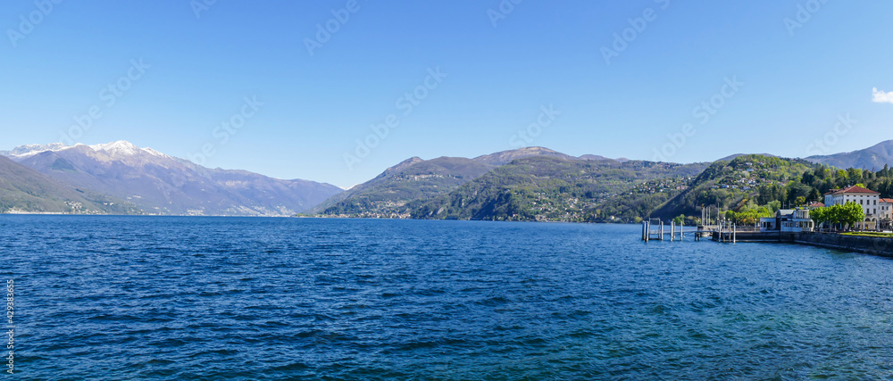 extra wide view of the Lake Maggiore with the coast of Luino
