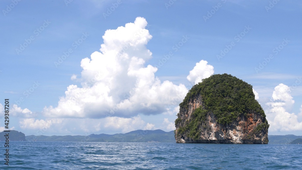 Exotic scenery islands with cloudscape and calm waters of Andaman sea in Krabi Province, Thailand. Exotic scenery islands with cloudscape and calm waters of Andaman sea in Krabi Province, Thailand.