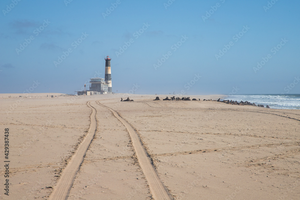 The oceanfront lighthouse at Sandwich Harbour in Namibia