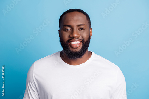 Positive handsome african young man toothy beaming smile