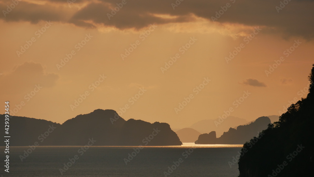Majestic seascape and sea surface with reflected sunset lights background, beautiful calm sea.
