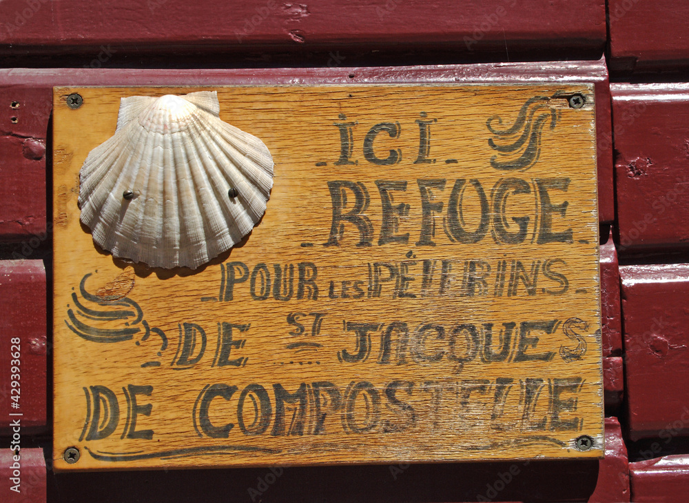 Saint Jean Pied de Port, France - Shell as a symbol of the pilgrimage route to Santiago de Compostela. The Pilgrim's Road is World Heritage Site by UNESCO.