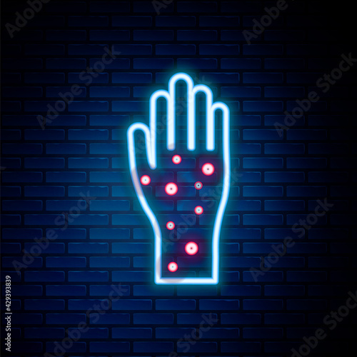 Glowing neon line Hand with psoriasis or eczema icon isolated on brick wall background. Concept of human skin response to allergen or chronic body problem. Colorful outline concept. Vector