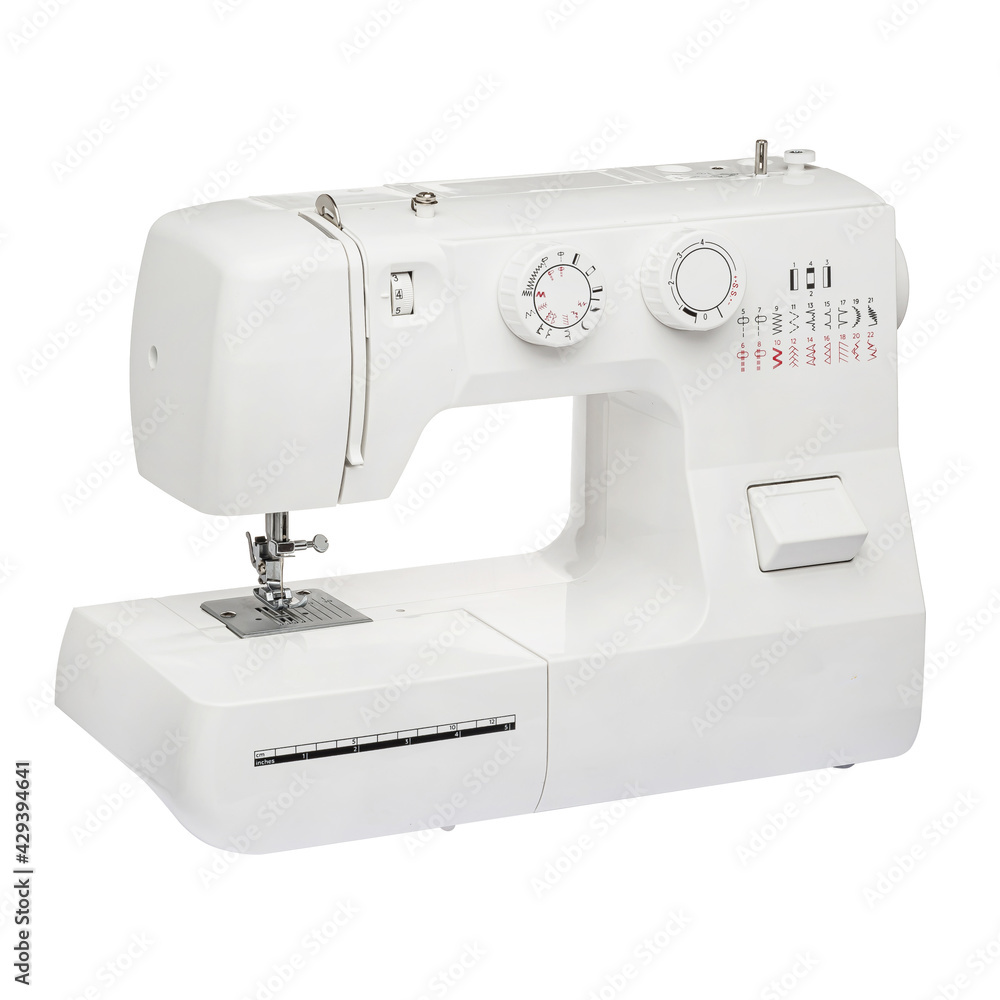 Sewing machine for sewing clothes from fabric on a white isolated background. Front view