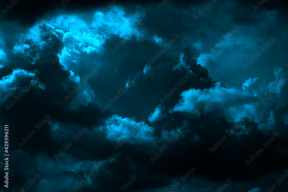 Dark blue green sky. Thunderclouds. Dramatic sky background with copy space for design. Web banner. Epic scene. Majestic, magical, creepy, fantastic, horror, mystical.