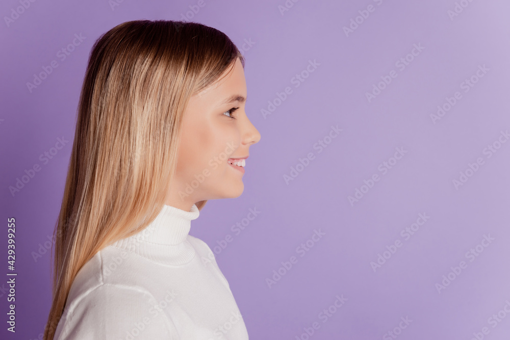 Profile photo of cheerful friendly lady look copyspace toothy smile wear white jumper posing on purple background Profile photo of cheerful friendly lady look copyspace toothy smile wear white jumper posing on purple background