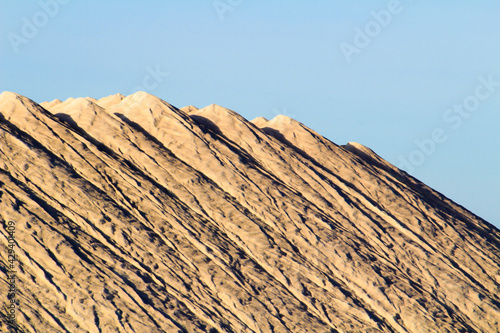 Salt mountains under blue sky in Spain