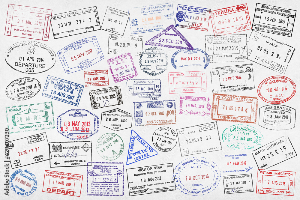 Fullframe close-up on worldwide passport stamps.