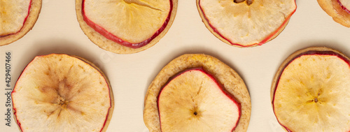 Banner of Applesnaps or gingersnaps with a cutted apple on top photo