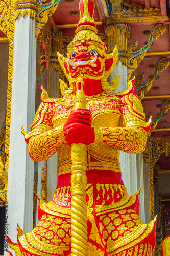 Temple guardian Yaksha Wat Don Mueang Phra Arramluang Bangkok Thailand. photo