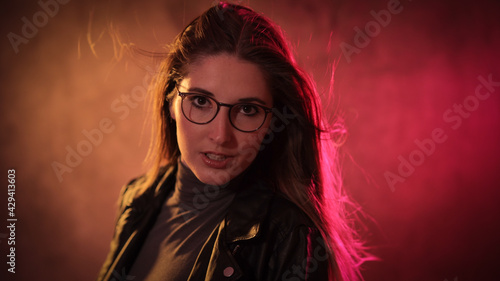 Young energetic woman - colorful portrait shot - studio photography