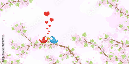 Birds in love on blossom branches
