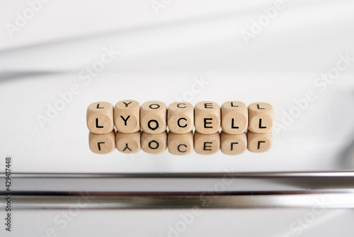 Word lyocell made by wooden cubes photo