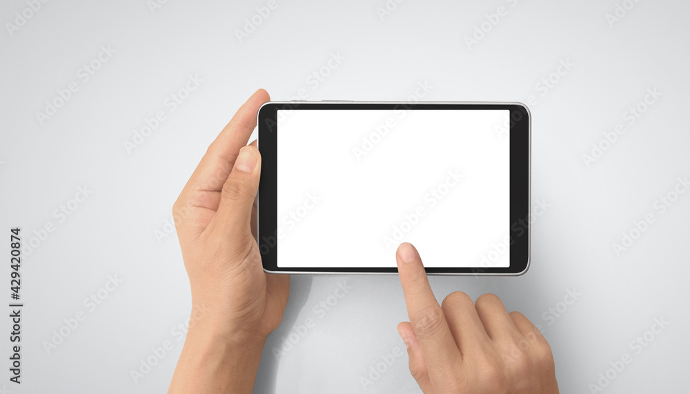 Hands holding tablet touch computer gadget Hands holding tablet touch computer gadget
