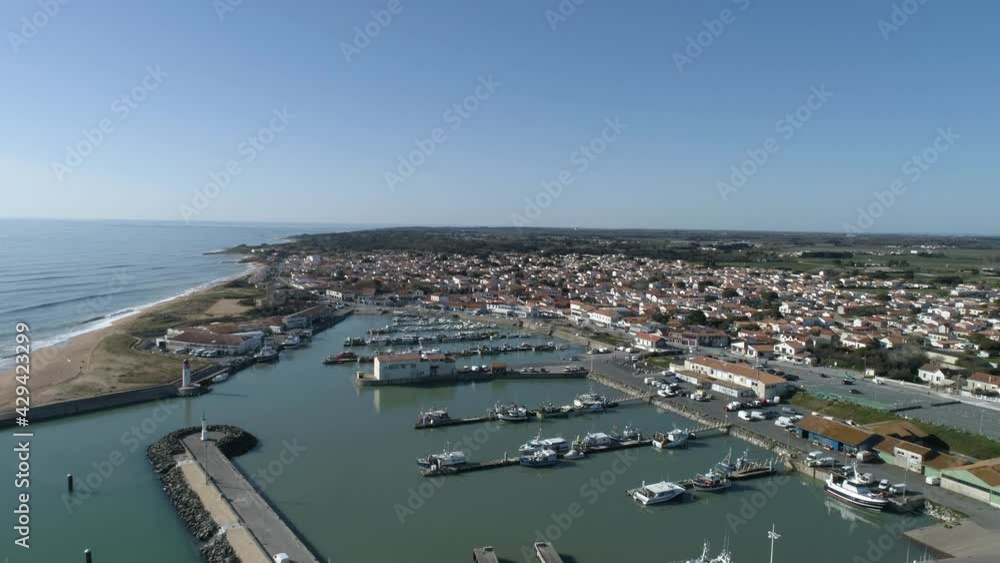 Fishing village of La Cotiniere on Oleron Island France with main marina visible, Aerial flyover shot Fishing village of La Cotiniere on Oleron Island France with main marina visible, Aerial flyover shot