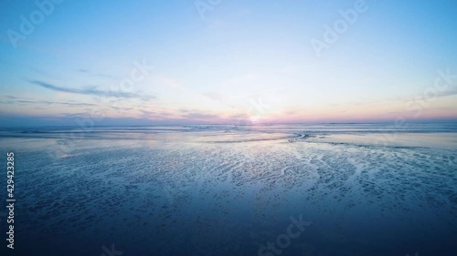 drone flight over the north sea after sunset