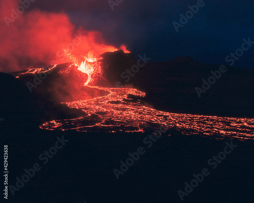 Lava river erupting from the volcano in the night in Iceland.