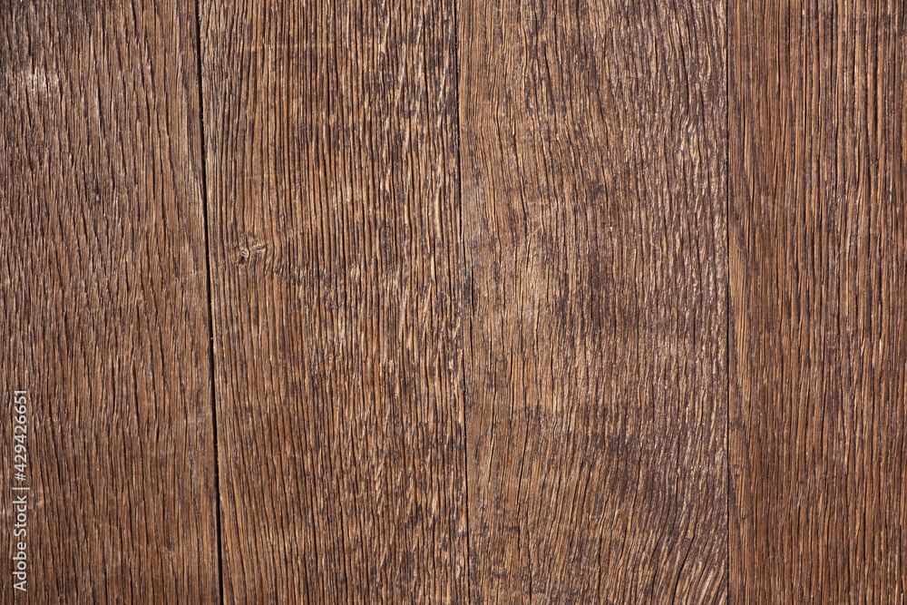 Antique wooden oak shield. Scratched and weather-beaten. Vintage background. Antique wooden oak shield. Scratched and weather-beaten. Vintage background.