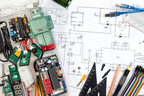 DIY microcontroller board or IOT microcontroller board for creating robot and robotic. Microcontroller education board for learning and building robot at school. Robotic education background.