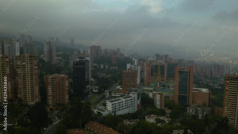 Backwards Aerial View of Medellin, Colombia on Gray Afternoon Backwards Aerial View of Medellin, Colombia on Gray Afternoon