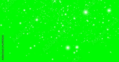 Snow falling on green screen background
