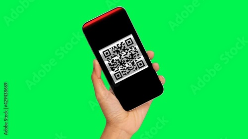 Wallpaper Mural hand holding a smartphone with a QR code reading on the screen, green background, chroma key, mockup. qr code scan on mobile phone. For e-commerce, shopping, payment, contact tracing. 4K Looped video. Torontodigital.ca