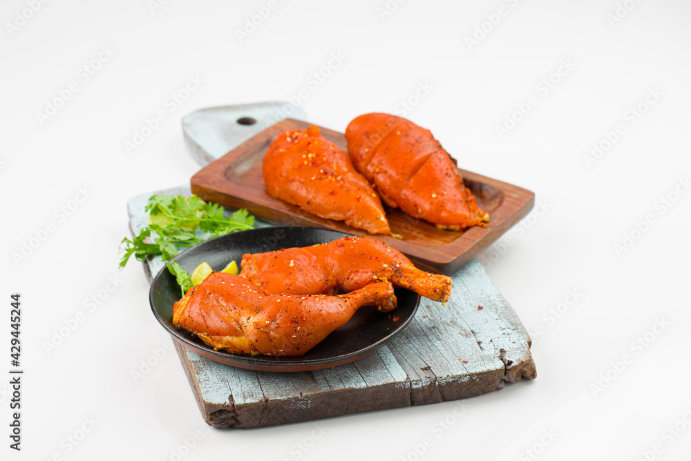 Marinated chicken legs and breast fillet Marinated chicken legs and breast fillet