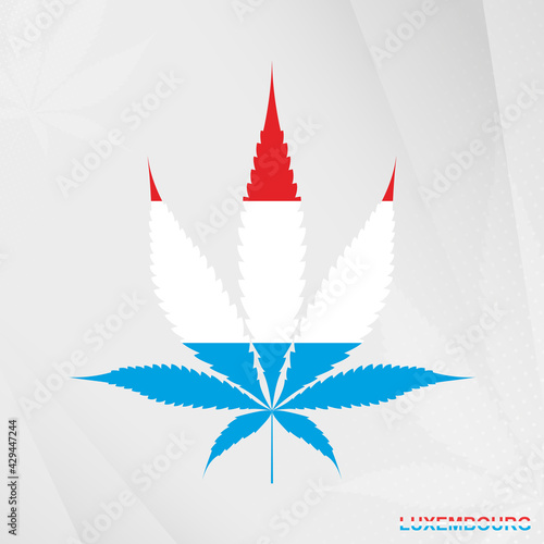 Flag of Luxembourg in Marijuana leaf shape. The concept of legalization Cannabis in Luxembourg.