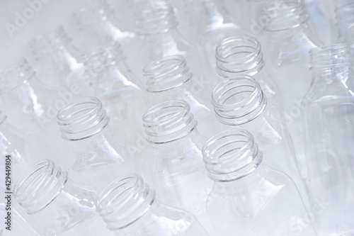 Clear plastic bottles for storing water or medicine.