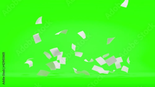 Flying sheets of white paper swirling in the air in a whirlwind