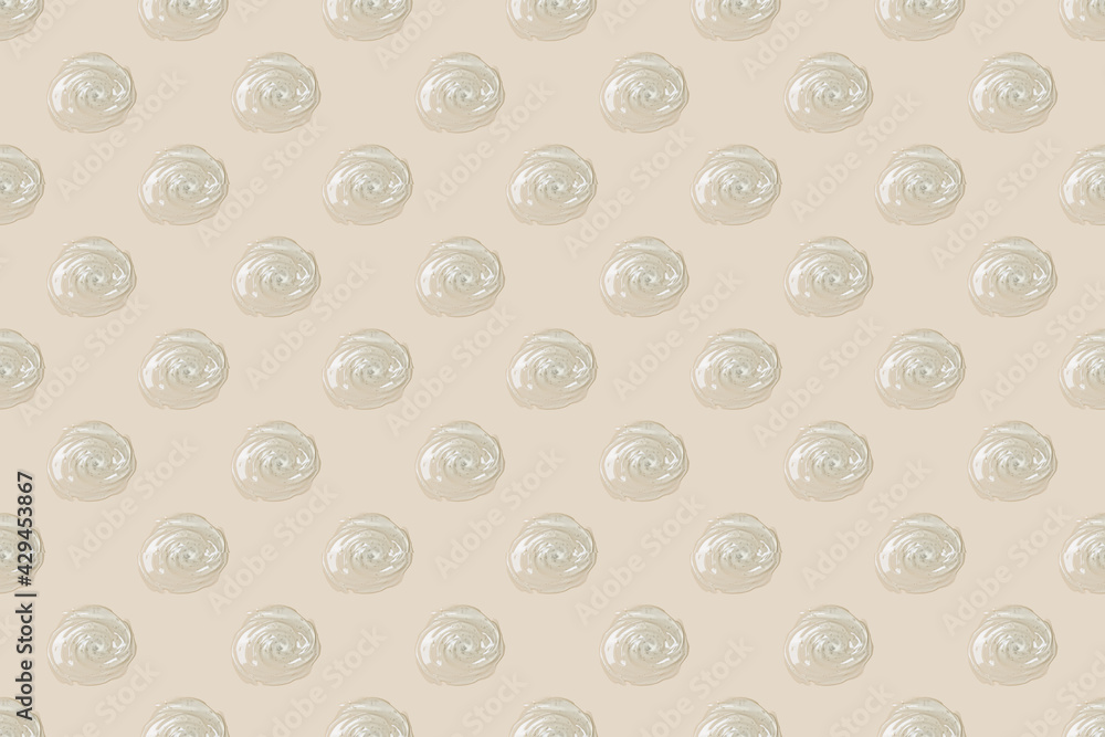 Abstract cosmetic background from drops of transparent gel or antiseptic, hyaluron. Creative pattern