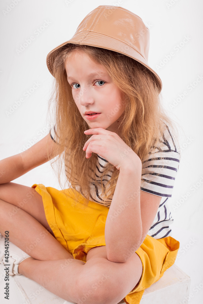 Happy young cheerful girl have fun and smile on isolated background Happy young cheerful girl have fun and smile on isolated background