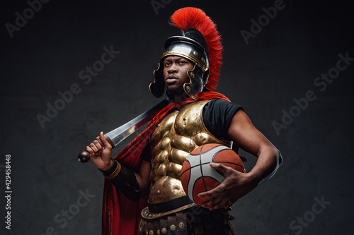 African legionary holding short sword and basketball