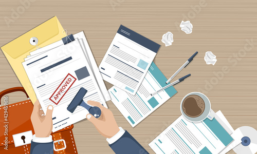 Approved stamp on paper. Hand stamping. Notary approving a documents. Vector illustration in flat style. Approved documents on wooden desk  top view.