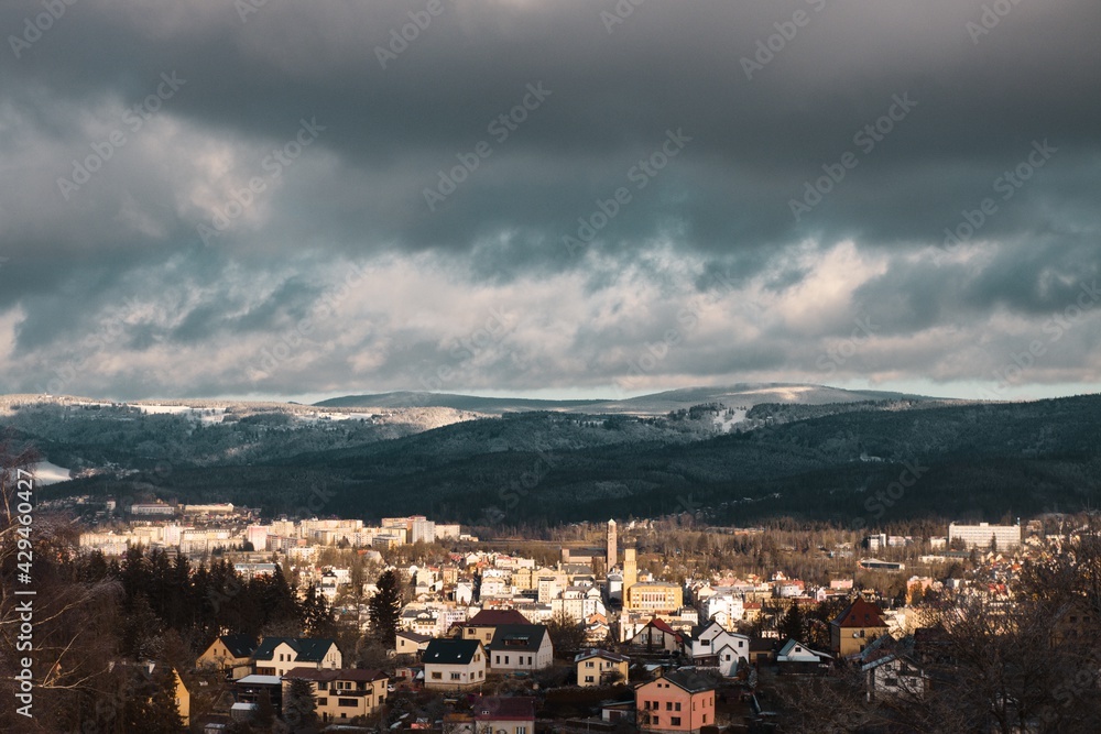 Beautiful view from above on the city (Jablonec nad Nisou). Dramatic cloudy sky.