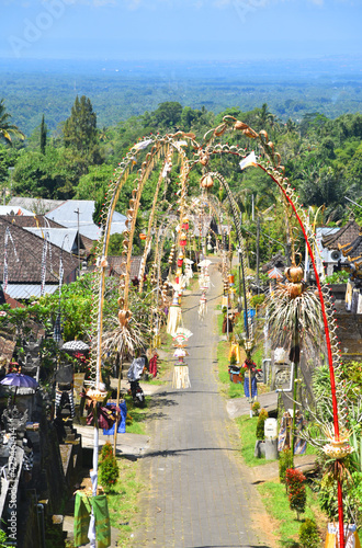 Traditional Balinese village decorated with bamboo and palm leafs decoration during a big Hindus ceromony photo