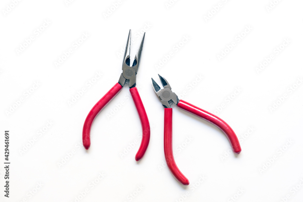 Cutter and pliers isolated on a white background Cutter and pliers isolated on a white background