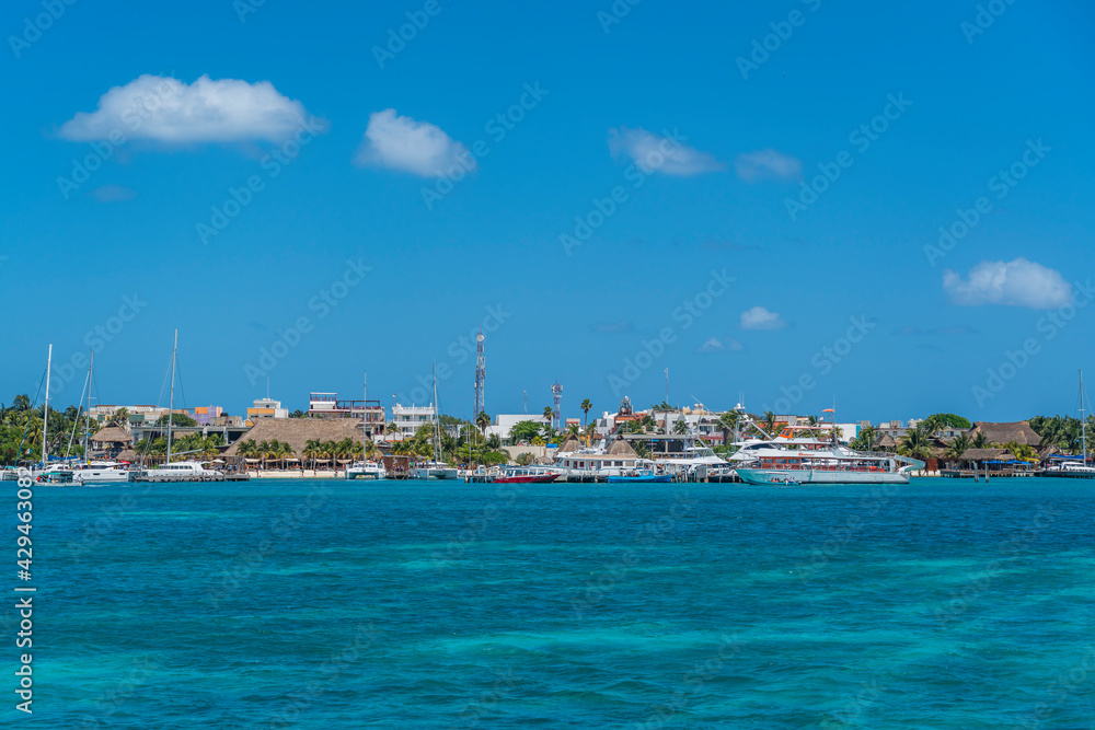 North beach on colorful Isla Mujeres island near Cancun in Mexico, view from the ferry